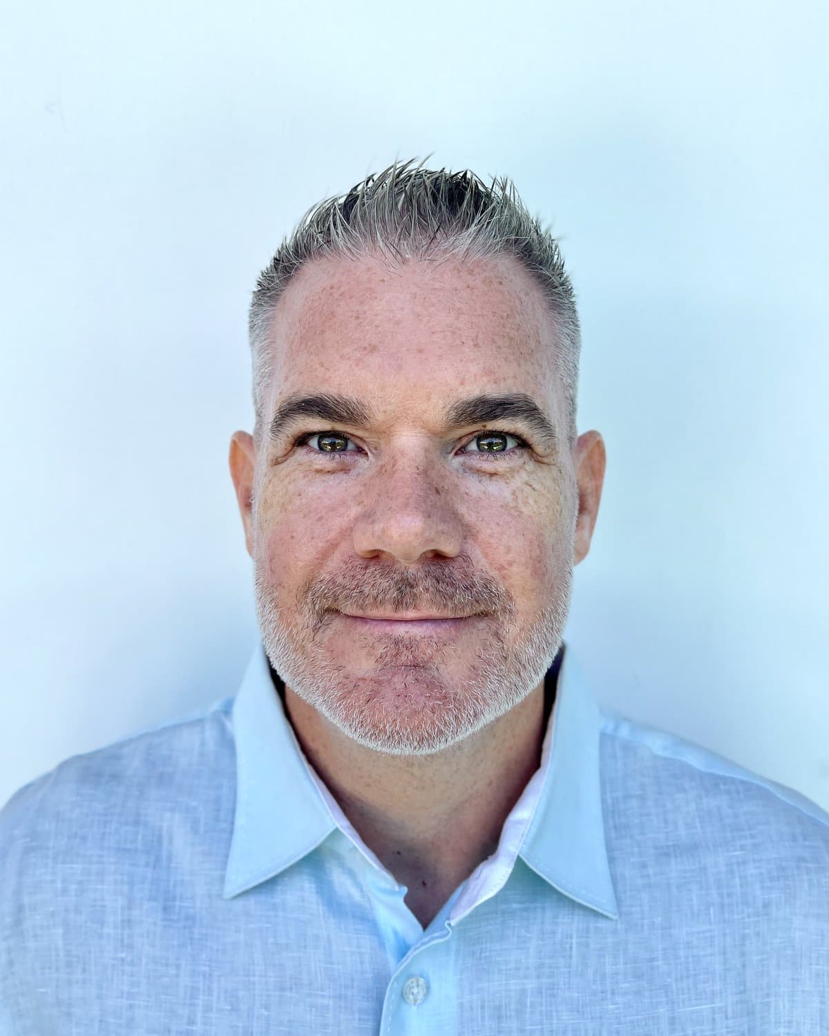 Portrait of Dominic Frei, founder of Freistyle AI. Swiss risk analyst with 15+ years across 50+ countries, former Head of Security at Loomis International.